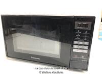 *PANASONIC SOLO BLACK MICROWAVE / POWERS UP, WELL USED, SOME DAMAGE TO DOOR AND CONTROL PANEL
