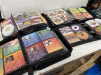 *4X CD HOLDER CASES CONTAINING CD'S OF MIXED GENRES