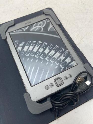 KINDLE WITH CASE AND CHARGER CABLE, TESTED AND WORKING