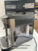 *DELONGHI MAGNIFICA EVO BEAN TO CUP COFFEE MACHINE / POWERS UP - NOT FULLY TESTED / SIGNS OF USE