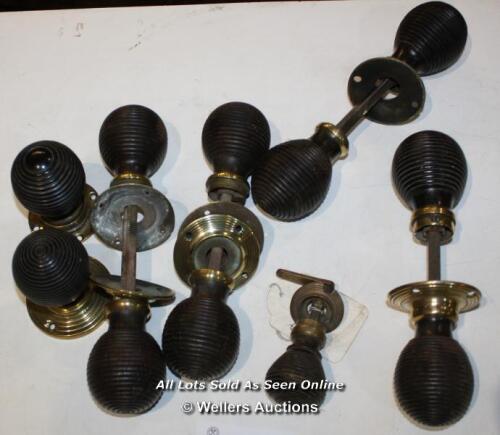 FIVE PAIRS OF EBONY BEEHIVE HANDLES AND ONE CUPBOARD LATCH