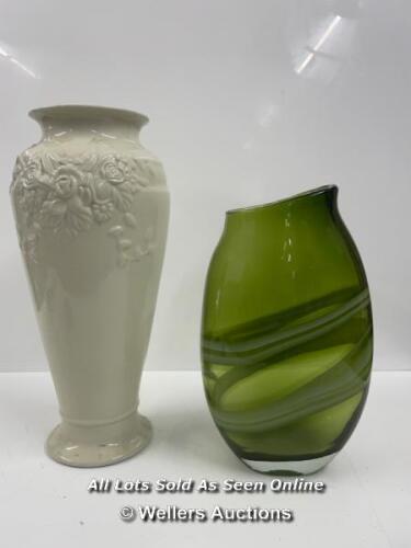 A LARGE GREEN GLASS VASE, 36CM AND LARGE CREAM VASE DECORATED WITH FLOWERS 46CM HIGH