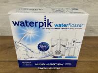 *WATERPIK WATER FLOSSER / NEW BUT MISSING ONE SET OF NOZZLES